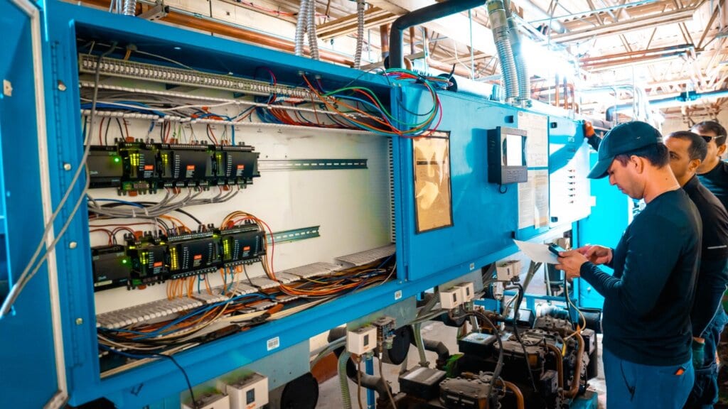 Dynamiq team preparing the equipment for commissioning